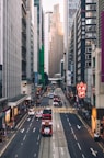 a city street filled with lots of tall buildings