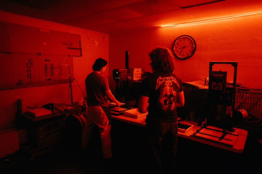 a couple of people standing in a room