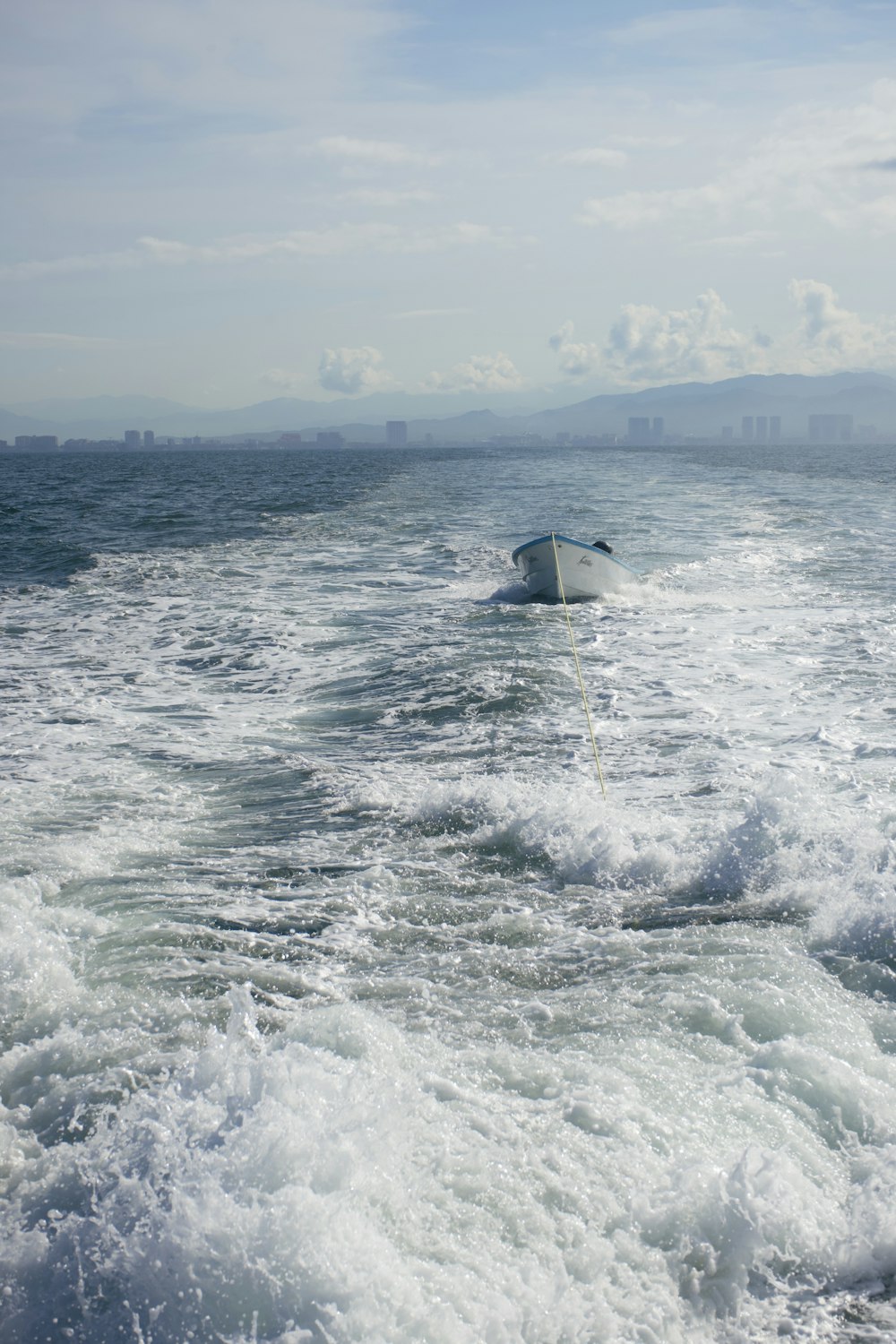 a boat in the middle of a body of water