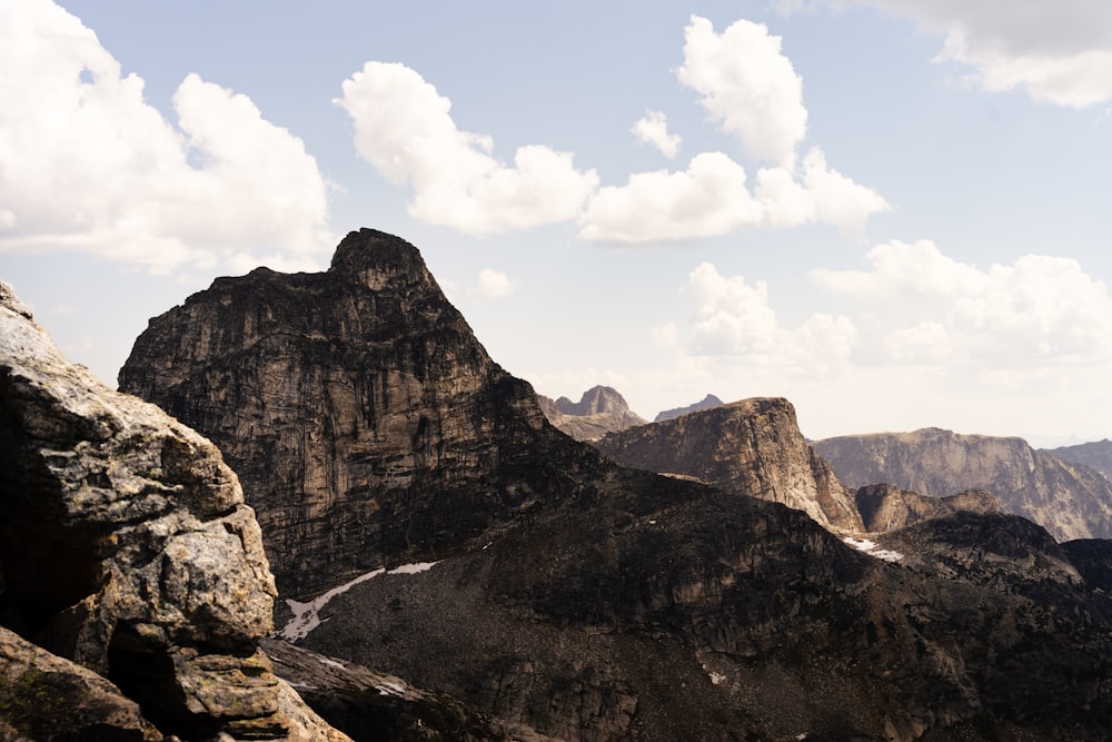 a view of a mountain range from the top of a mountain