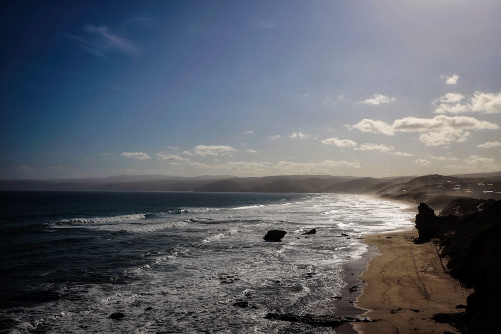 a view of the ocean from a cliff