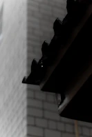 Detail of a flat roof repair with seamless waterproofing visible.