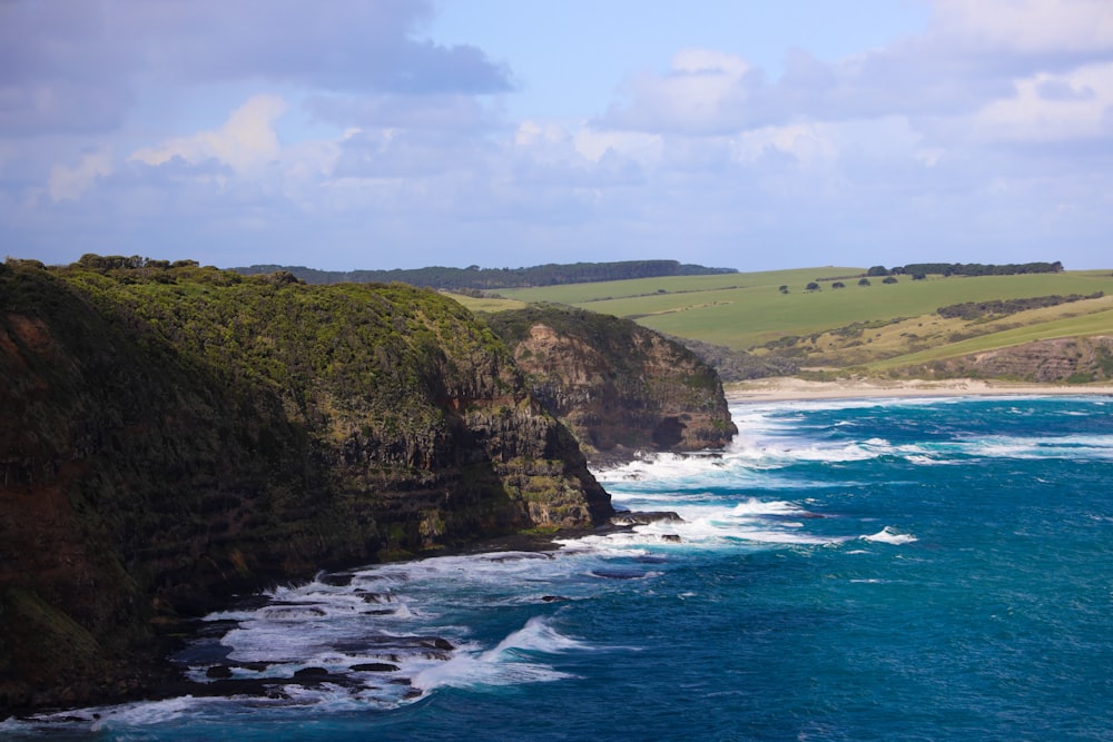 a view of the ocean from a cliff