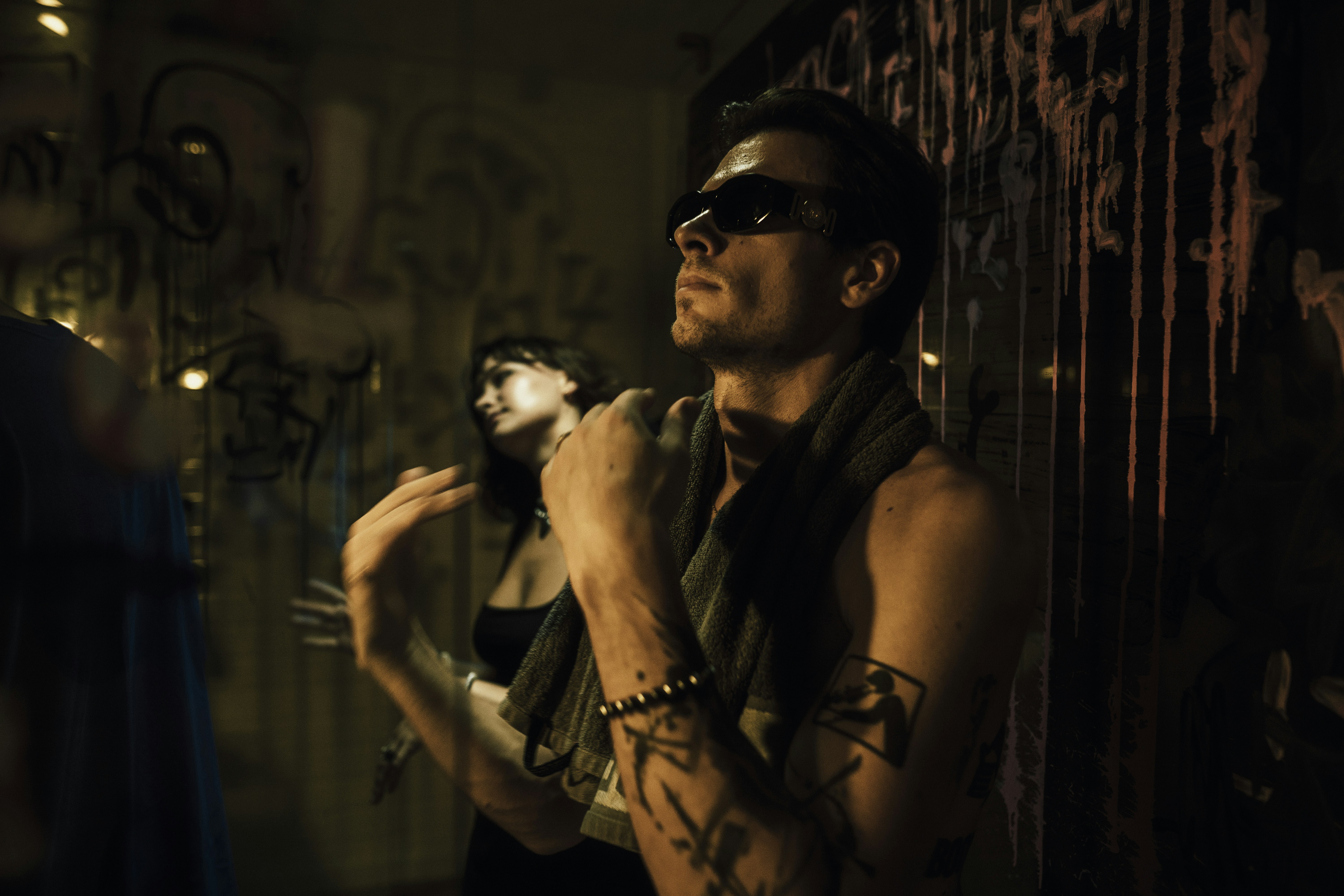 a man with a scarf around his neck