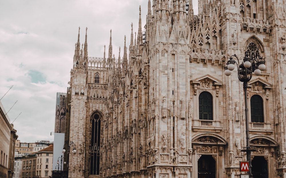 a large cathedral with a clock on the front of it