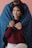 A happy customer wrapped in a cozy Martinezretai throw blanket.