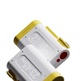 A close-up view of two modern electronic devices with a digital display showing the time 23:45 PM. The devices feature a sleek design with smooth white surfaces and vibrant yellow accents at one end. The image highlights the details of the devices, including button placements and rounded edges.