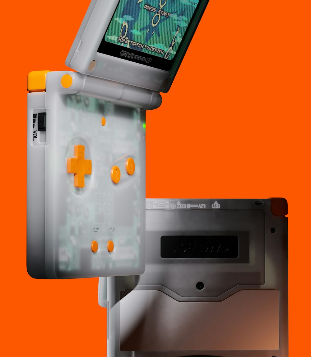 a nintendo wii game system with an orange background