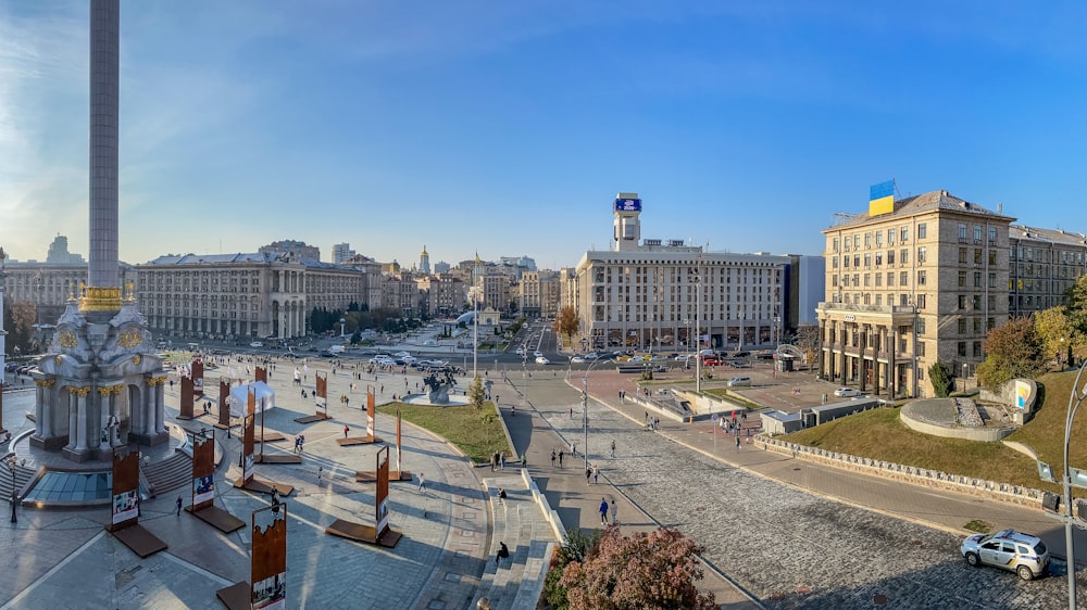 a view of a city with a fountain in the middle of it