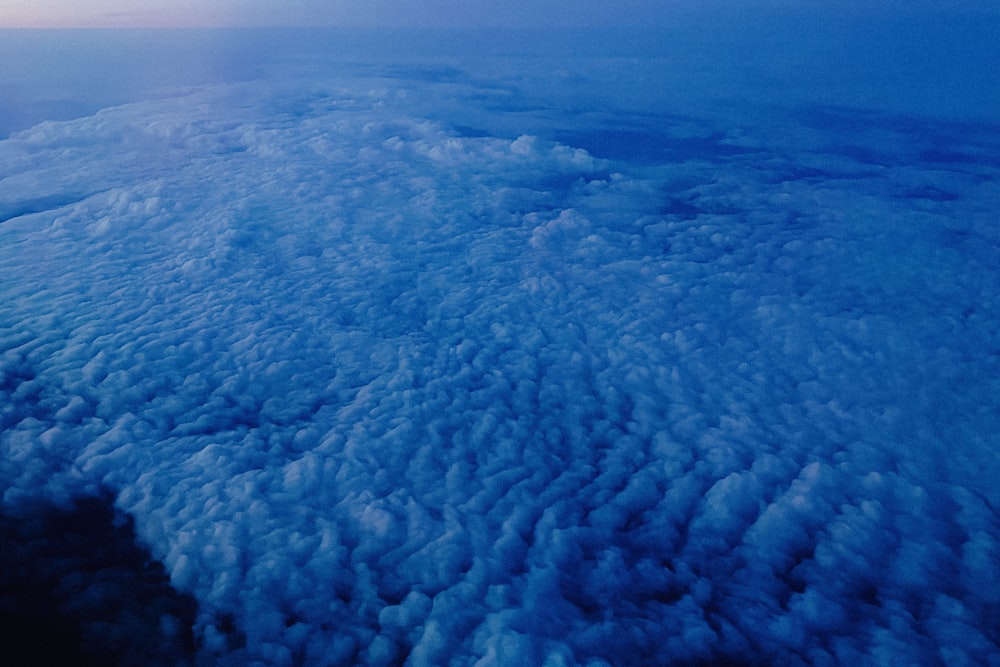 a view of the clouds from an airplane window