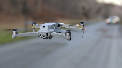 A drone monitoring traffic flow on a busy road.