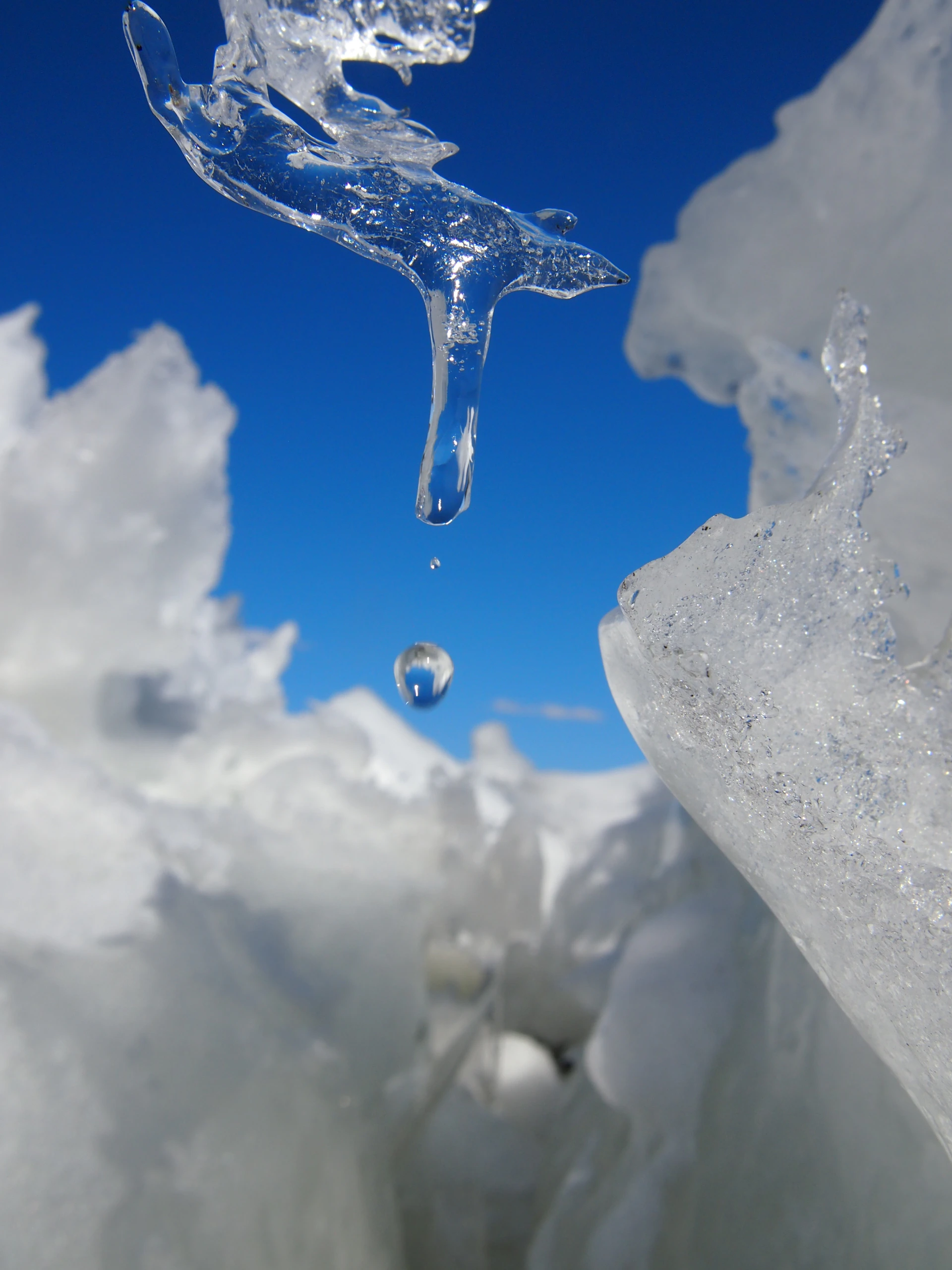 a picture of ice and a blue sky