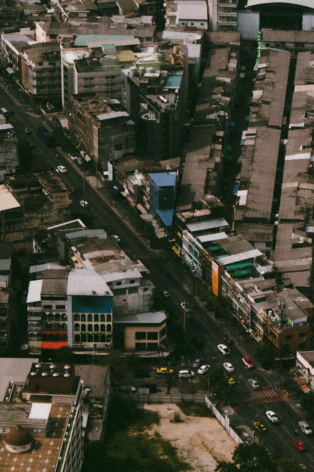 an aerial view of a city with lots of tall buildings