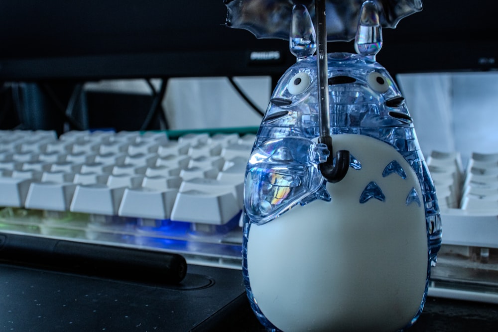 a close up of a computer mouse near a keyboard