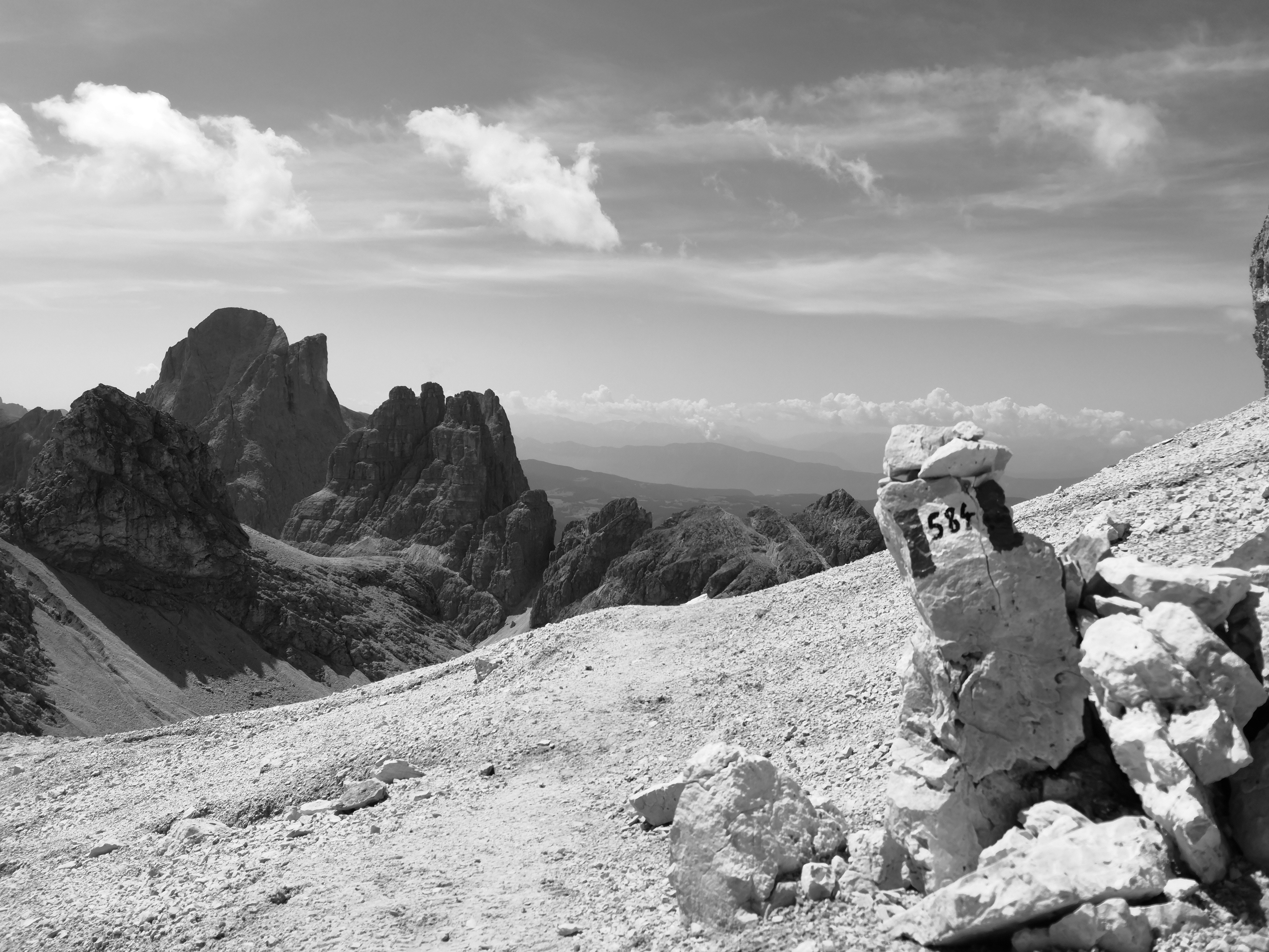 a black and white photo of a mountain range