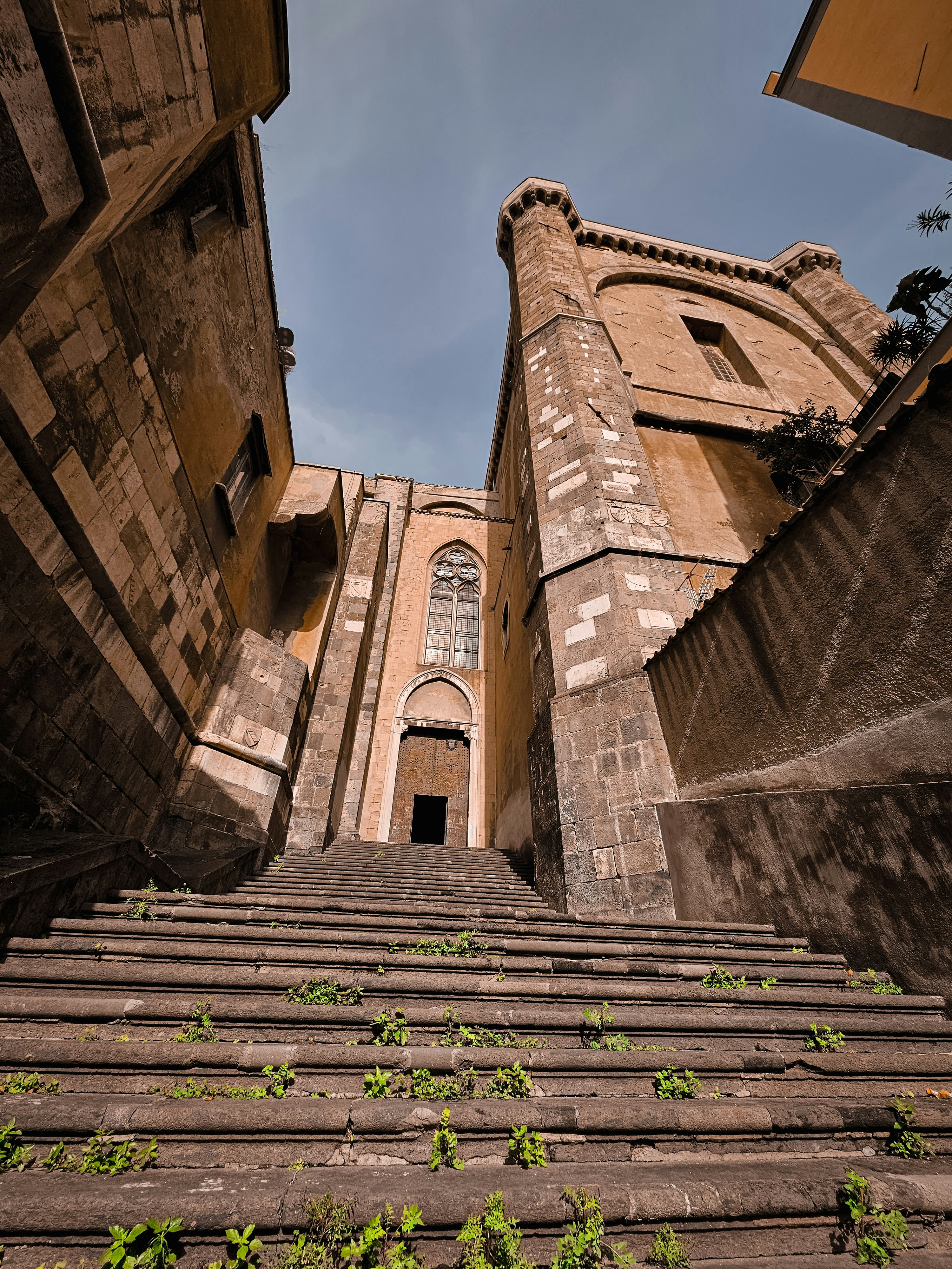 a very tall building with a bunch of stairs leading up to it
