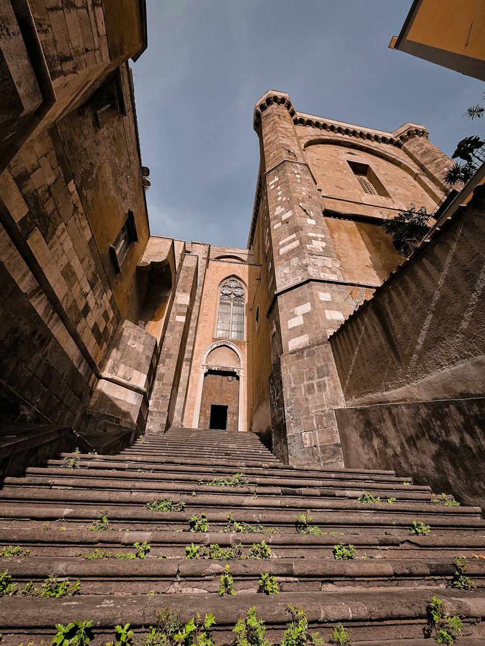 a very tall building with a bunch of stairs leading up to it