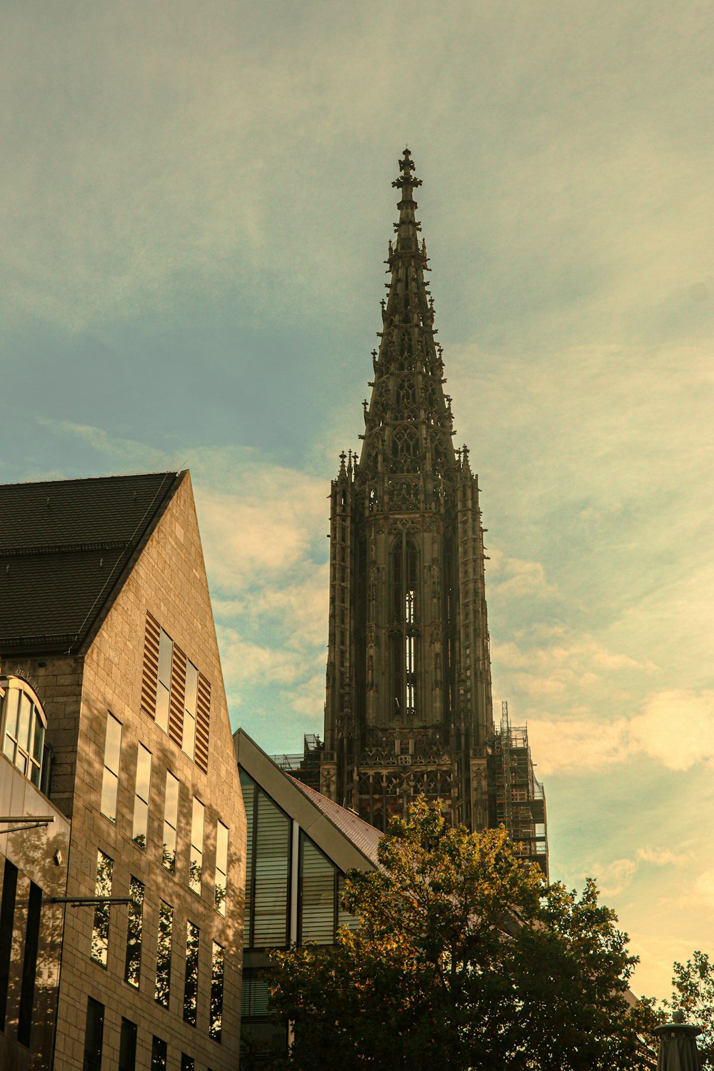 a tall clock tower towering over a city