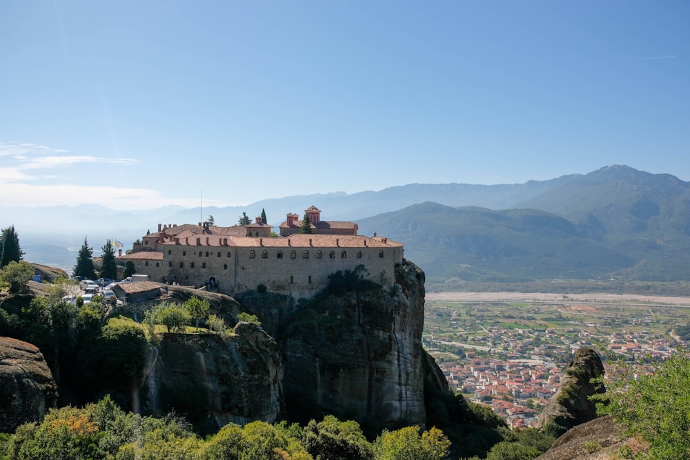 a castle perched on top of a cliff