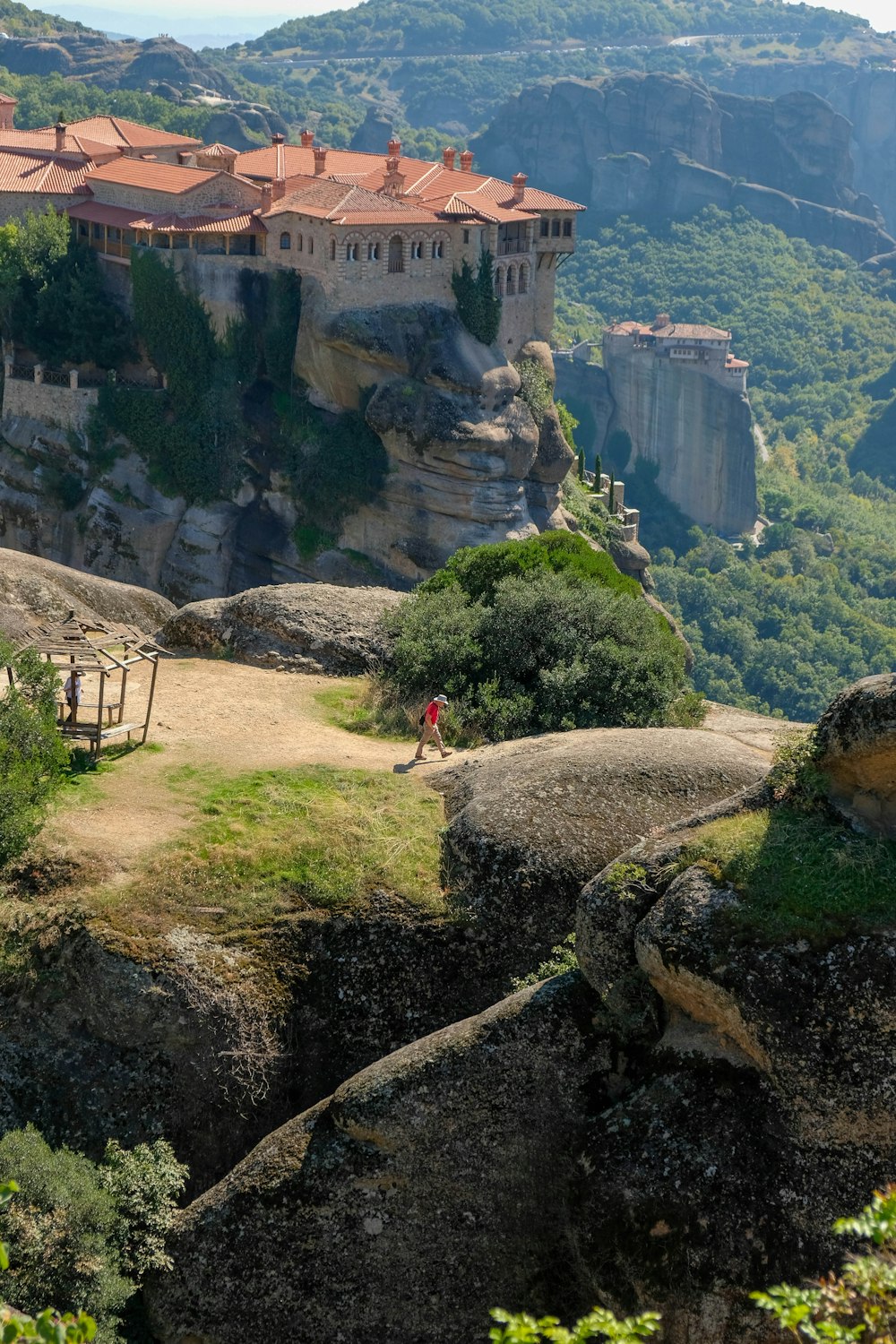 a scenic view of a castle on a cliff
