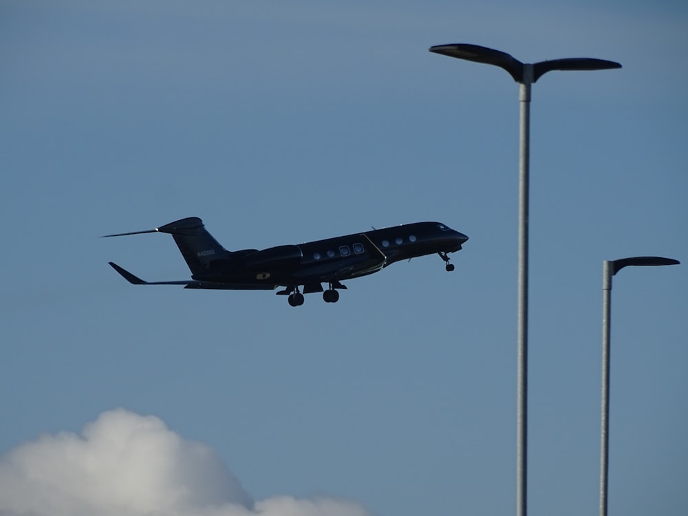 a small plane is flying low to the ground