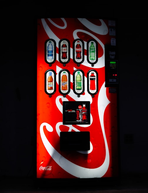 Close-up of a vending machine stocked with healthy beverage options