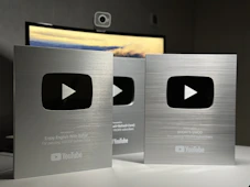 a couple of metal boxes sitting on top of a table