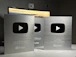 a couple of metal boxes sitting on top of a table