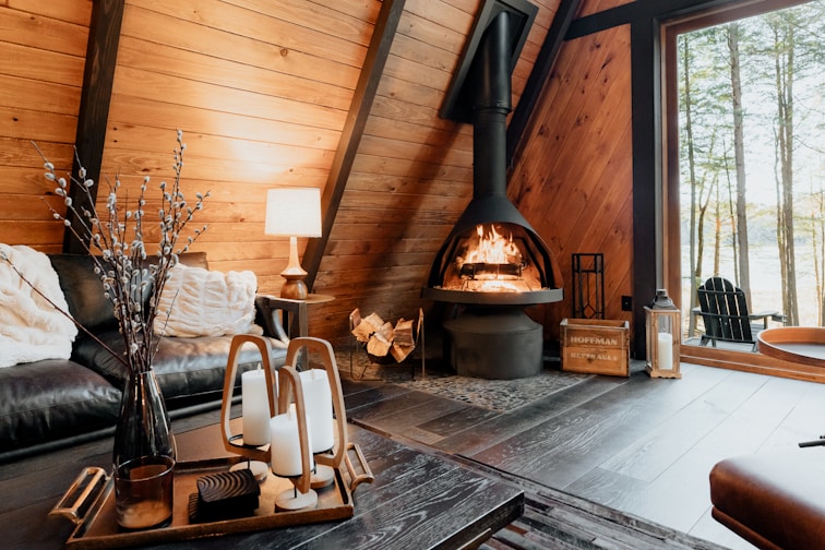 a living room with a fire place inside of it