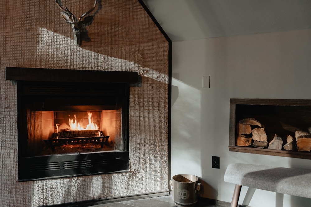 a living room with a fire place and a chair