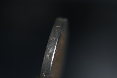 Close-up of a U.S. coin showing a clear die crack along the rim.