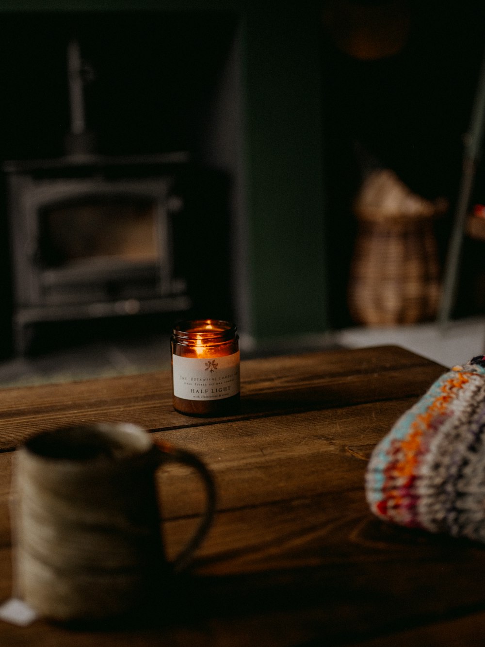 a candle sitting on top of a wooden table