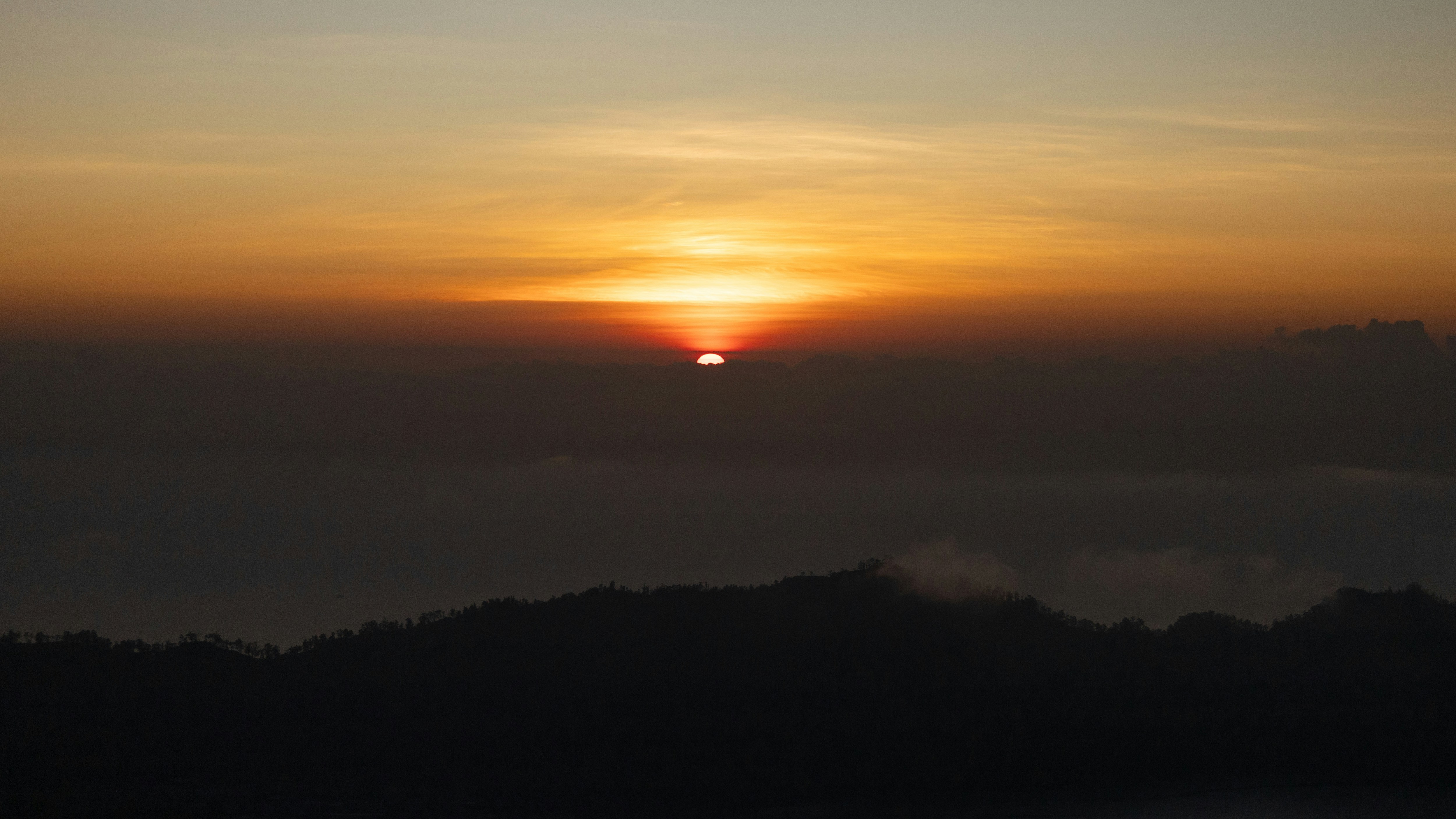 Watching the sun rise from the top of the famous Mount Batur volcano is one of the most important to do's in Bali.
