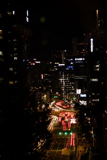 A bustling city skyline at night, highlighting urban adventures.