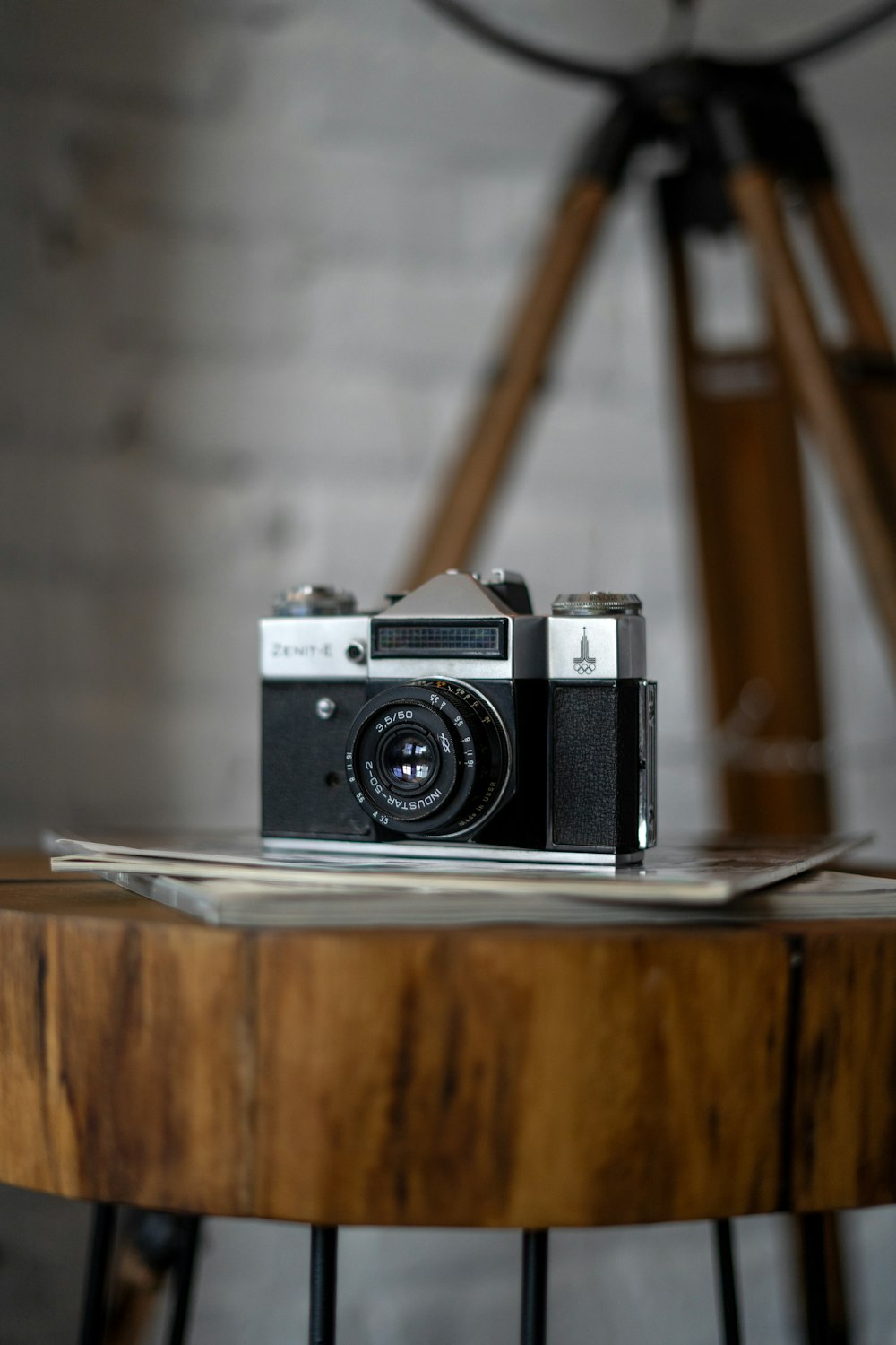 a camera sitting on top of a wooden table