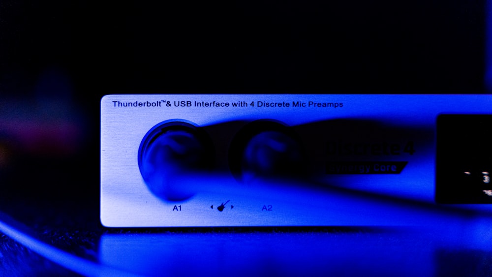 a close up of a blue light on a device