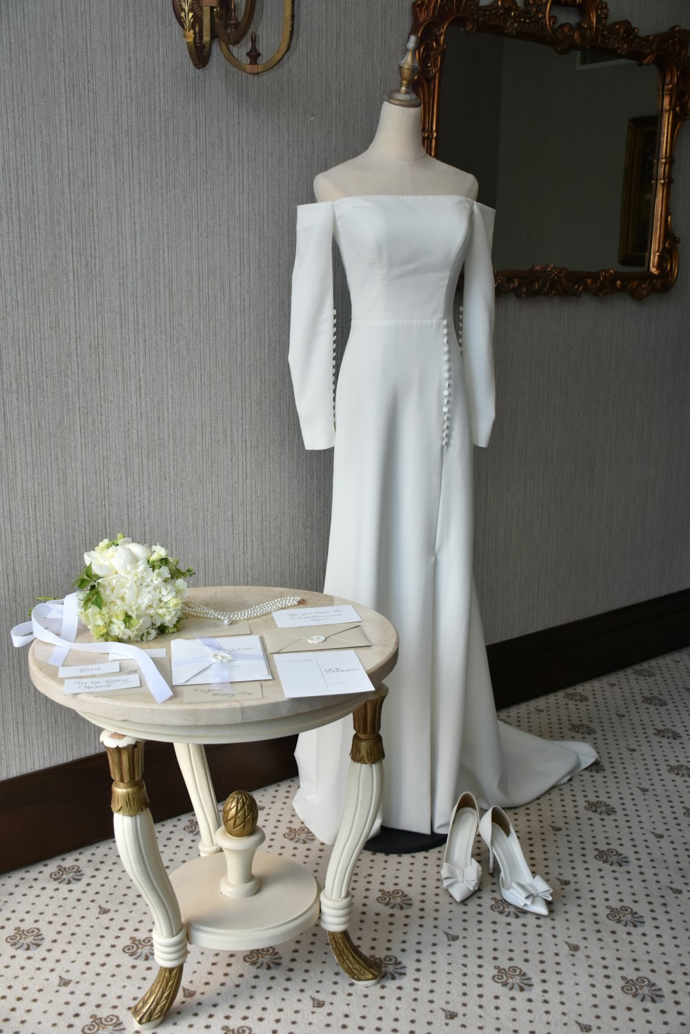 a white dress on display in a room