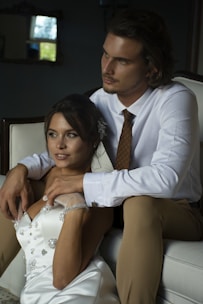 a man and a woman sitting on a couch