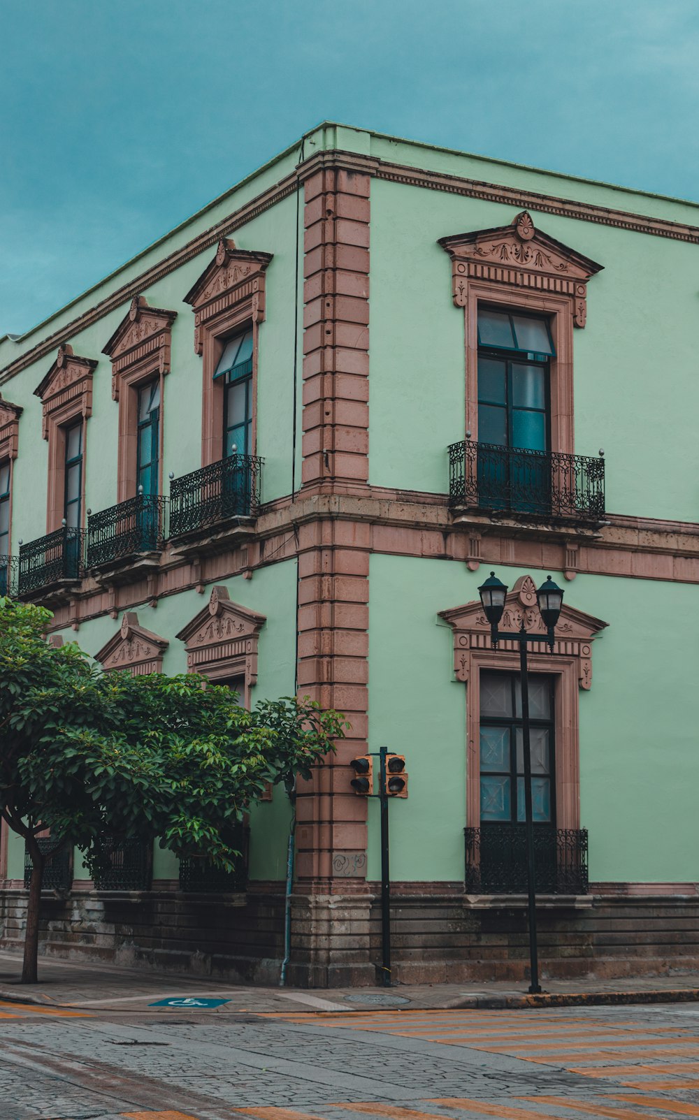 an old building with balconies and balconies on the top of it