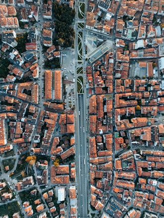 an aerial view of a city with lots of buildings