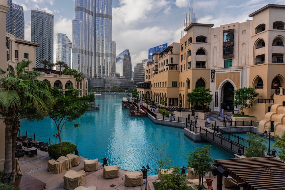 a large swimming pool surrounded by tall buildings