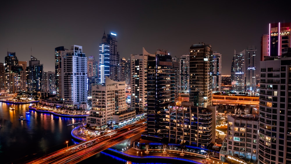 a view of a city at night from the top of a building