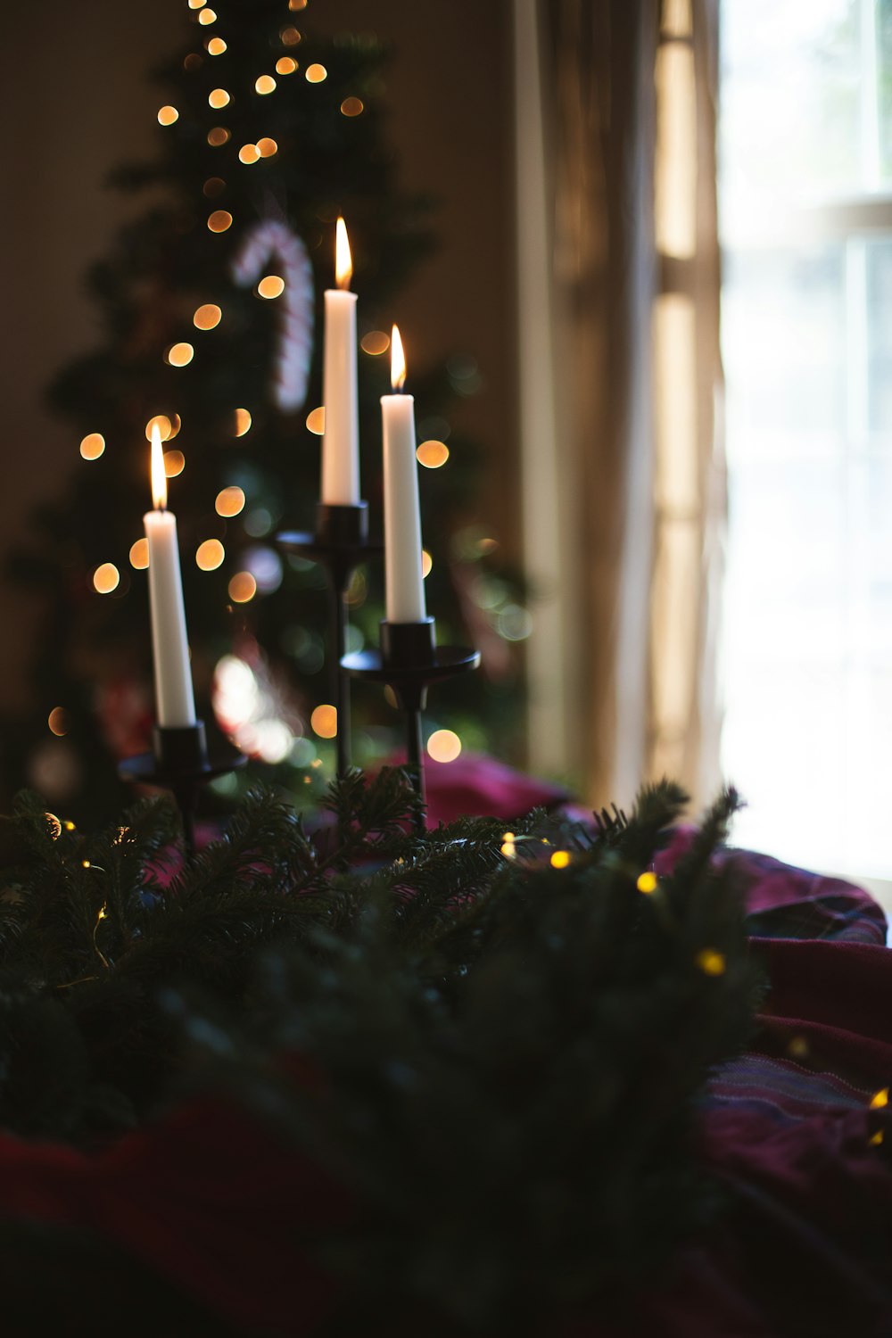 a group of candles sitting on top of a table