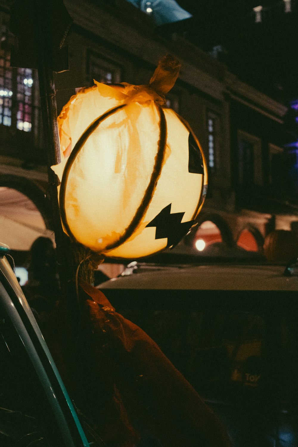 a street light sitting on the side of a road