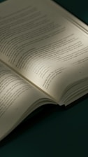 an open book sitting on top of a table