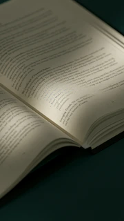 an open book sitting on top of a table