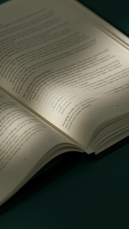 an open book sitting on top of a table