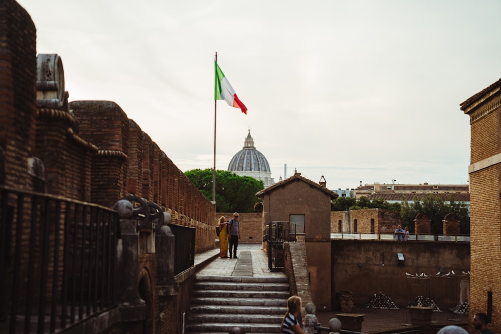 a group of people walking down a set of stairs