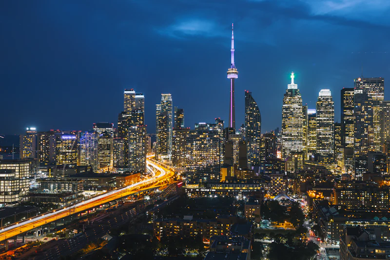 The Toronto skyline at dusk with the financial district lit up