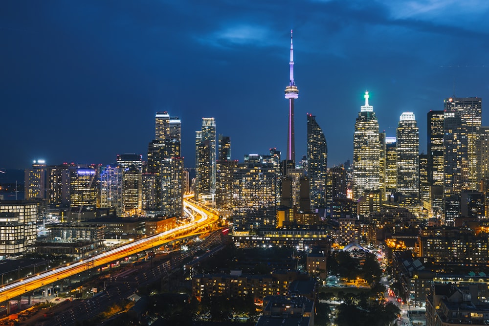 a view of a city at night from the top of a building